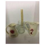 Three liquor pitchers