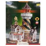 Lemax lighted building. Schooner Point Lighthouse