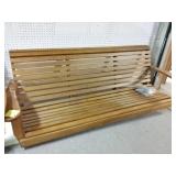 Porch swing. 79" long. Comes with chains