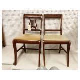 2 chairs. "Musical". One is missing a part of the