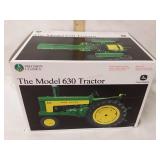 1/16th scale John Deere Model 630 tractor.