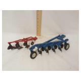 4 bottom plow and 3 bottom plow toys