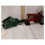 Auburn rubber tractor. (Farmers head missing) and