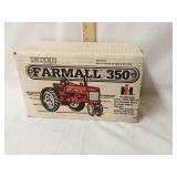 1/16th scale International Farmall 350 tractor.