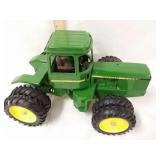 1/16th scale John Deere swivel tractor. No