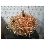 Lighted electric berry basket with tin stars
