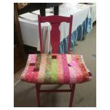 Handmade quilt with pink wooden chair