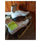 Vintage white ice skates , tongue rubber is