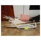 Laundry basket filled with curtain rods