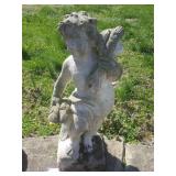 Concrete cherub statue