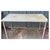 Folding table, 48 x 24 x 28 in, corner is damaged