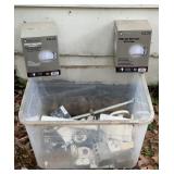 Tote full of light fixture accessories. 2 brand