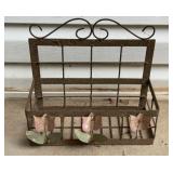 Vintage-style wrought iron wall planter with