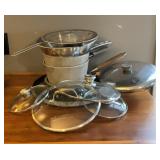 Pots, Pans, serving bowl, strainers, lids.