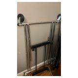 2 rolling clothes racks unknown complete