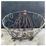 2 Metal hanging planters . Both have wear