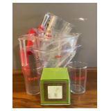 4 OXO plastic measuring cups. 2 Glass Anchor