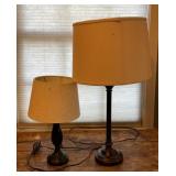 2 black table lamps. Larger one is 29in tall both