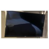 Samsung TV with Remote powers on with Wall Mount