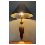 Brown table lamp with a green shade. 26in