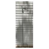 Green metal shepherds hook. 82in tall