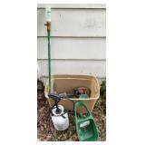 Tote full of  garden things.  Scottï¿½s turf