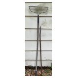 Wood rake and a metal breaker bar.