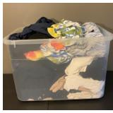 Clothes in tote with lid, Eddie Bauer shirts,pants