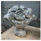 Vintage cement garden finial in the shape of a