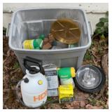 Tote full of garden supplies. And a bird feeder