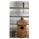 Terracotta bird house and metal bird. 12in tall