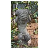 Vintage concrete  garden statue of a  cherub,
