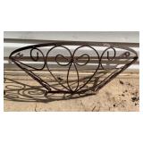 Metal outdoor wall plant holder. 28x11x8 has a