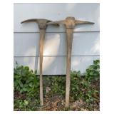 To pickaxes one of the wooden handles is broken