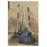 Yard tools. 2 Rakes, shovel and water hose