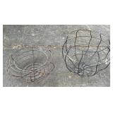 Two metal flower pot holders larger one is 11 x