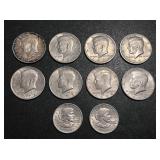 Lot of 10 coins, 8 half dollars & 2 one dollar coi