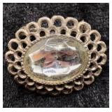 Vtg SilverTone Filigree Brooch Faceted Glass Cente