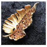 BSK Goldtone Leaf Brooch with Amber Rhinestones