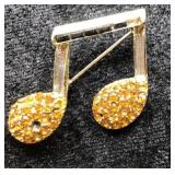 Gold-Tone Music Note Brooch with Amber Rhinestones