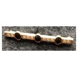 S.A.L. Gold-Tone Bar Brooch with Black Stones
