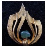 Gold Flame Brooch with Green Stone Accent