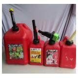 4 Gas Cans 1-  5 Gal,   3-   1 Gal