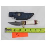 Damascus Knife With White Handle