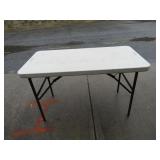 Plastic Table 29"T x 48"W x 24"D Plastic Table 29"T x 48"W x 24"D