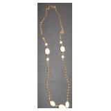 gold chain with white beads