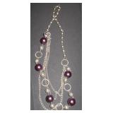 3 strands with purple balls and silver accent