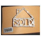 House the says 'SOLD'