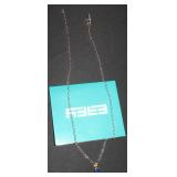 Silver chain with blue gemstone pendent