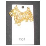Gold tone scotty dog brooch with blue gems